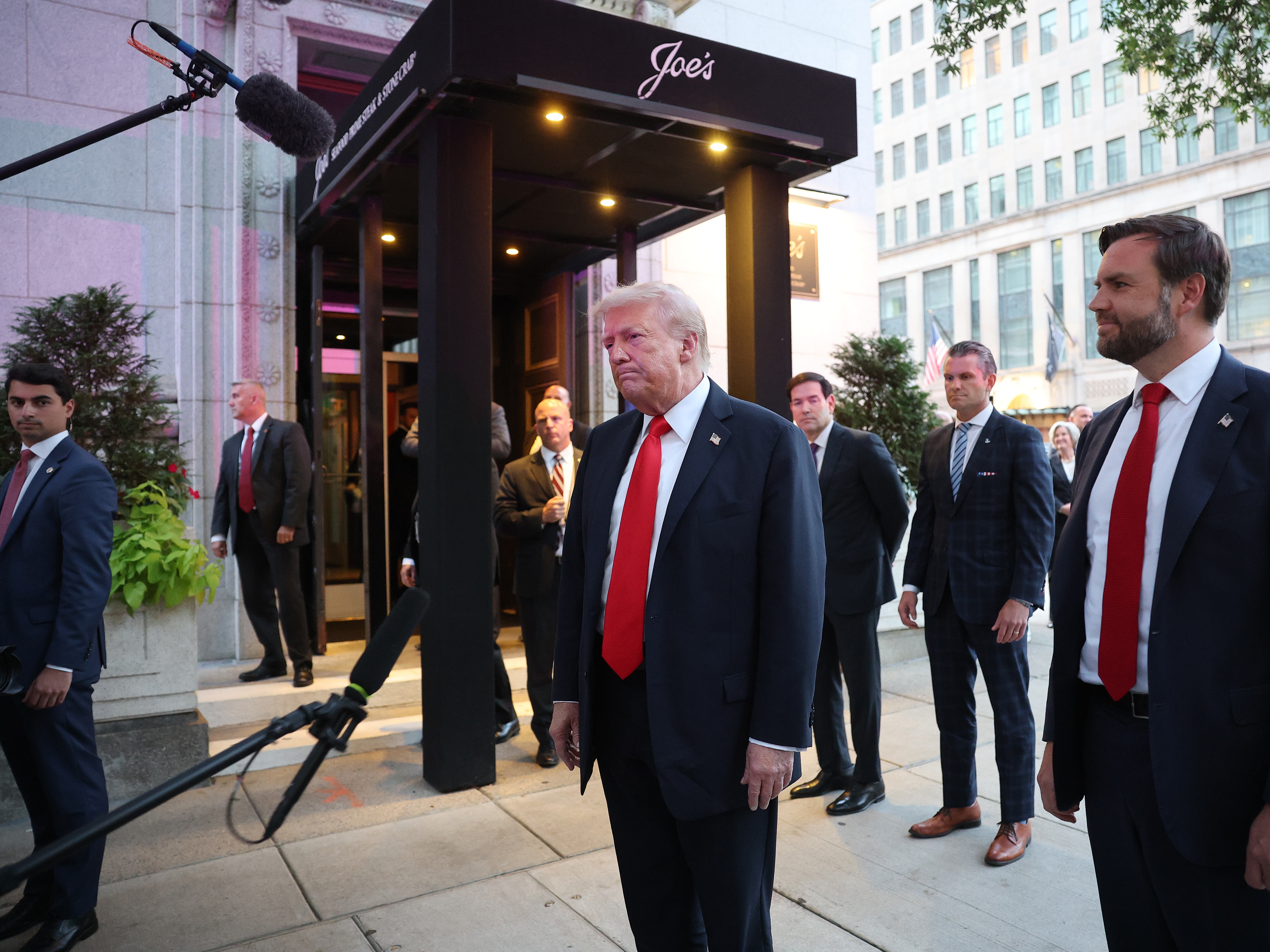 caption: President Trump arrives for dinner at Joe's Seafood in Washington D.C. on Tuesday, along with Secretary of State Marco Rubio, Defense Secretary Pete Hegseth and Vice President Vance.