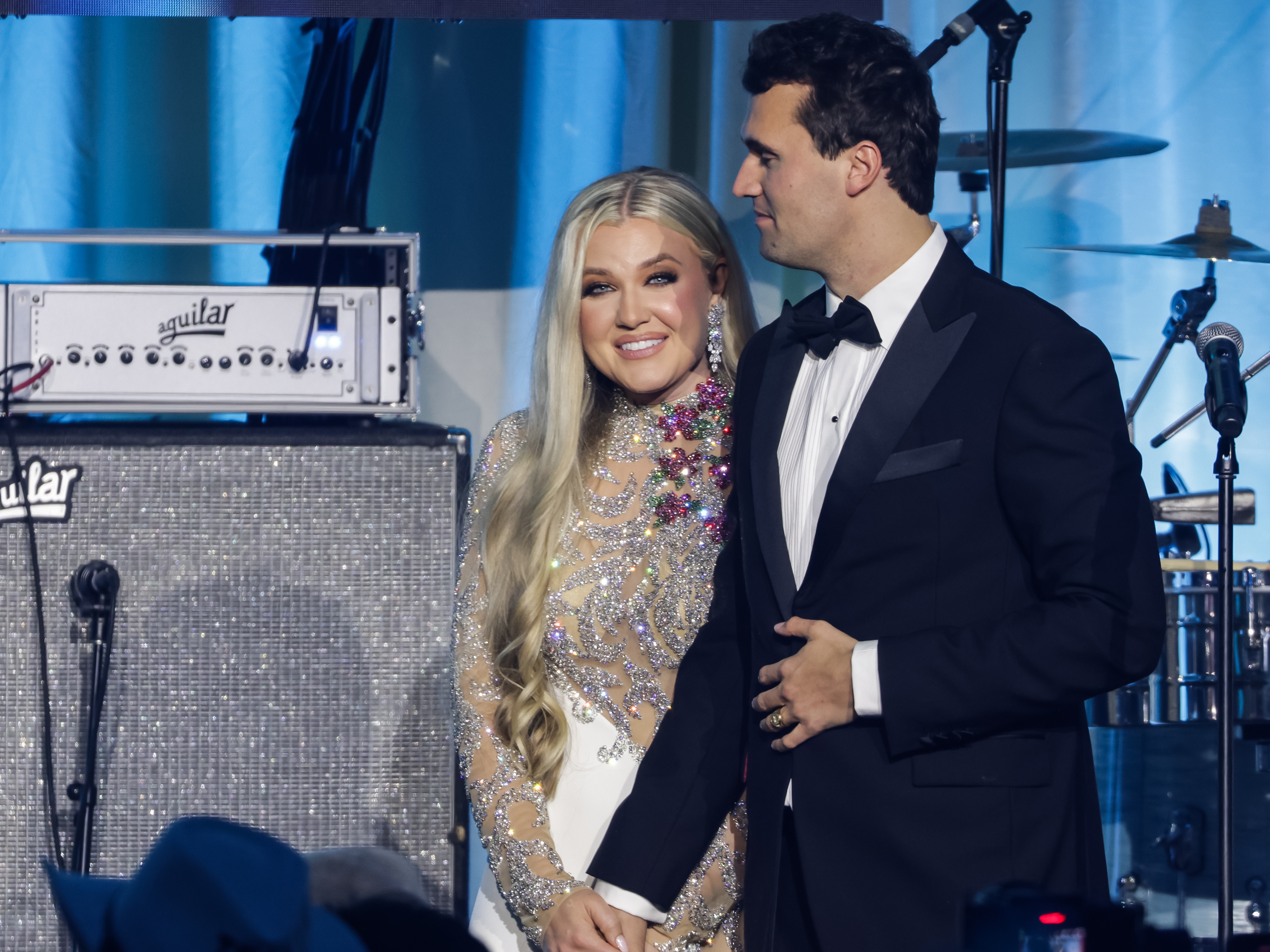 caption: Erika and Charlie Kirk pictured at the Turning Point USA Inaugural Eve Ball in Washington, D.C. in January. After his death, she was elected the new CEO of the organization.
