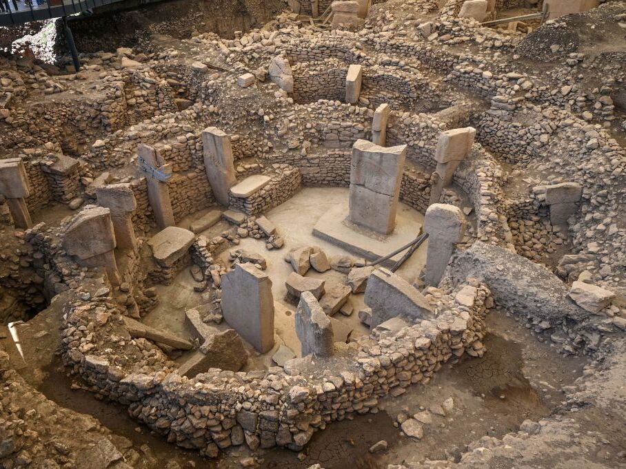 caption: Pillars at the archaeological site of Gobekli Tepe in Sanliurfa, Turkey, are seen in May 2022. Located on a rocky hill in southeastern Turkey, overlooking the plateau of ancient Mesopotamia, Gobekli Tepe, is the world's first known sanctuary and may have housed the world's oldest solar calendar.