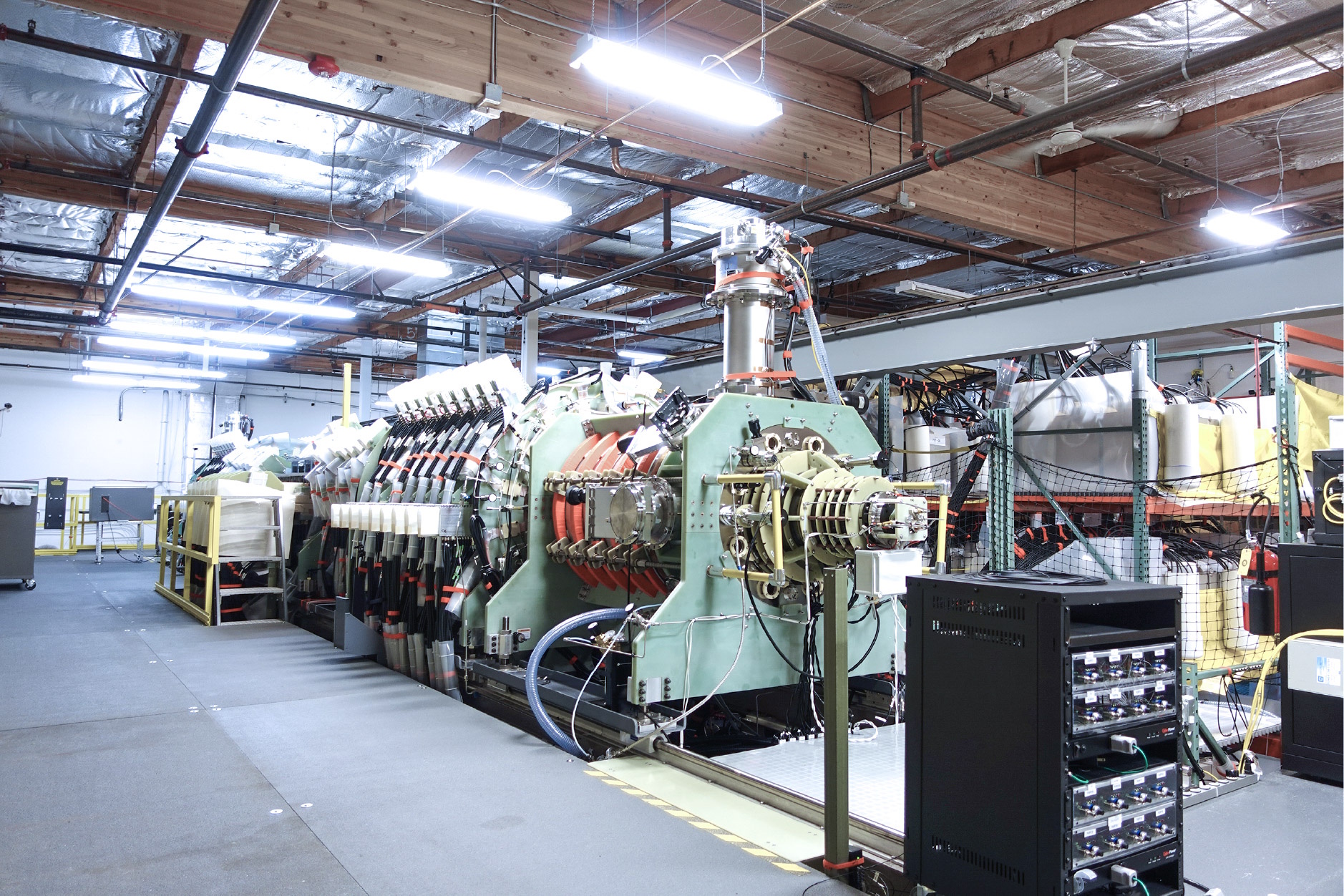 caption: Helion's trenta reactor, once its cutting edge model, is now one in a series of outdated versions in a progression of increasingly efficient reactors.