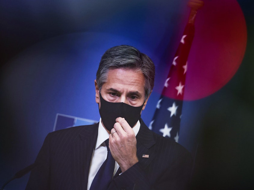 caption: U.S. Secretary of State Antony Blinken appears during a news conference at NATO headquarters in Brussels on Wednesday before an unannounced visit to Afghanistan.