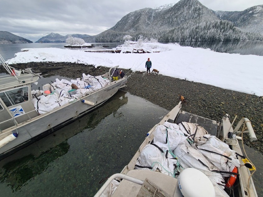caption: Bags of marine debris gathered from beaches in Haida Gwaii, British Columbia, on Dec. 17, 2021