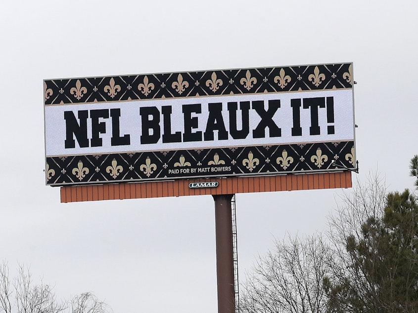 caption: Saints fans aren't happy with the NFL after a controversial no-call in Sunday's NFC championship game. One fan took out several billboards around Atlanta with his message for the league.