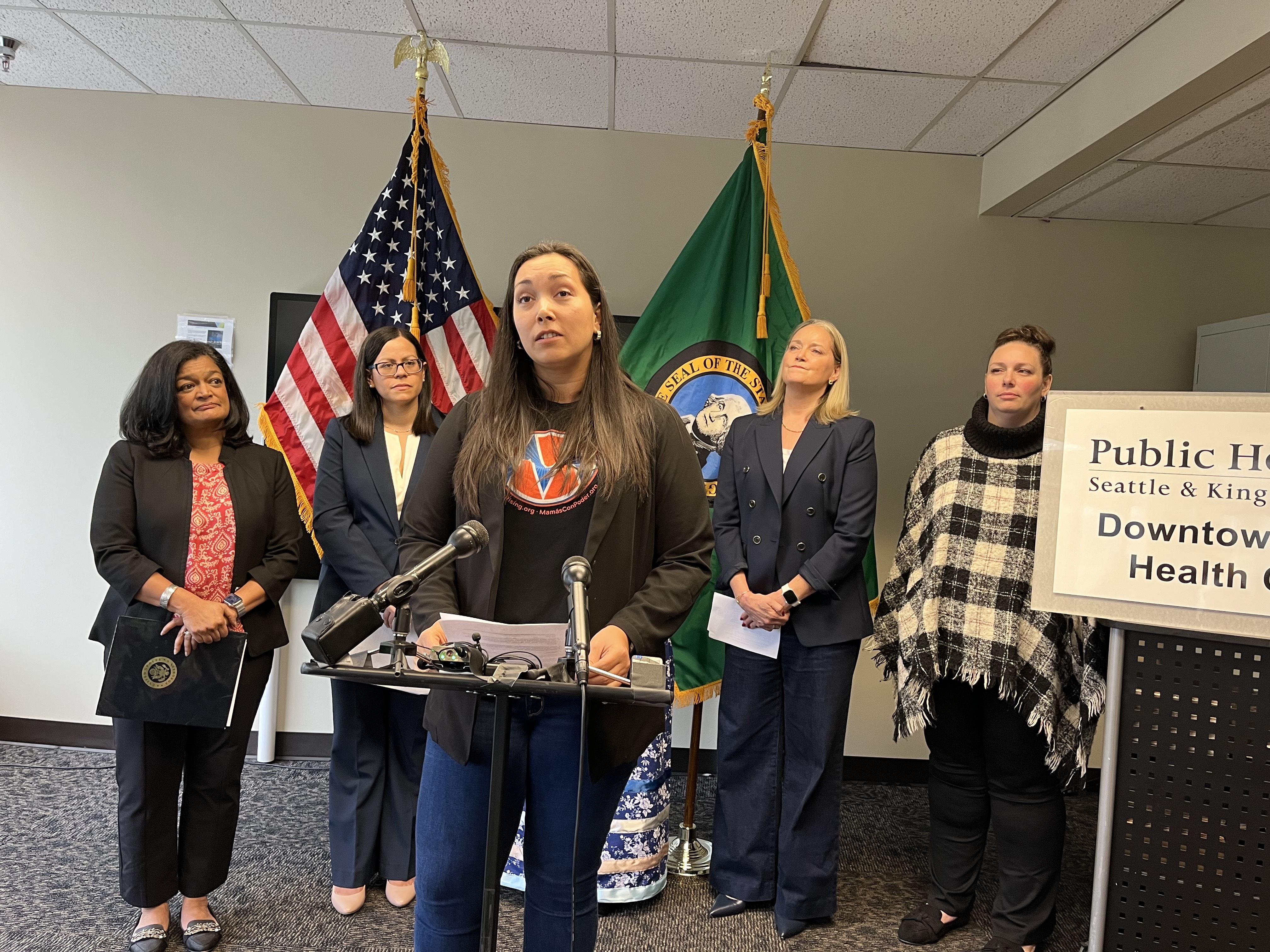 caption: Tacoma resident Bronti Lemke spoke against pending cuts to Medicaid eligibility at a Oct. 3, 2025 press conference convened by Rep. Pramila Jayapal (D-Seattle). 