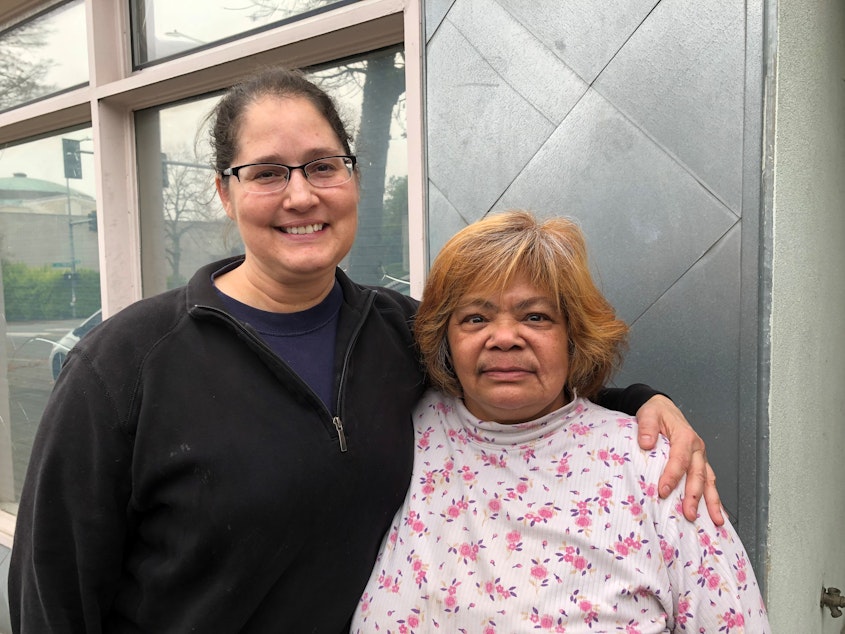 caption: Tenant advocates Sarah Stewart (left)  and Gina Owens say they want to prevent bias in the rental process. Landlords say Seattle laws are driving them away. 
