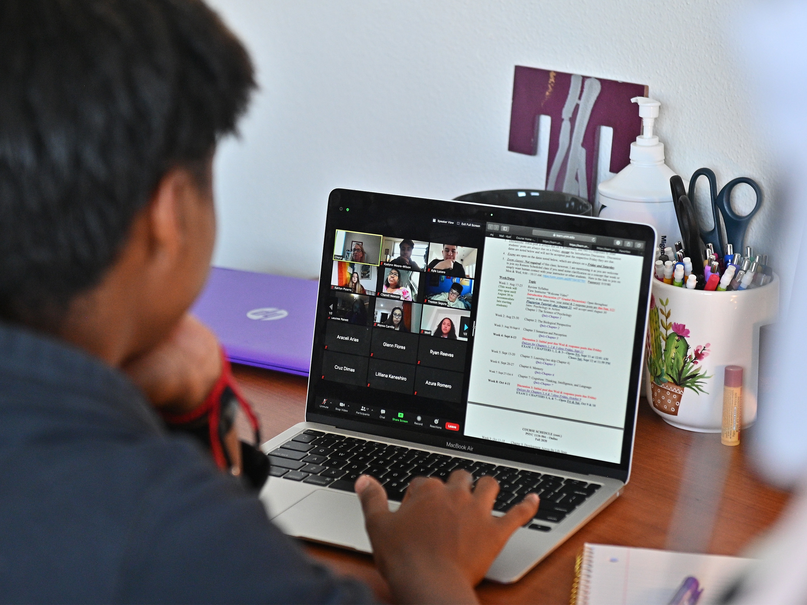 caption: More companies and schools are turning to Zoom's video meetings during the coronavirus pandemic, boosting sales and profit.