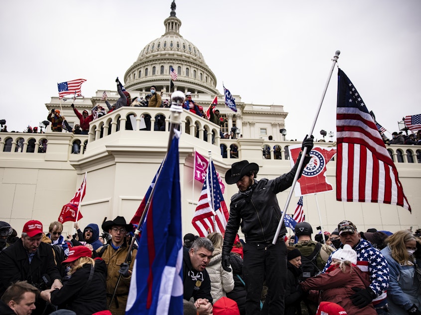 caption: Pro-Trump supporters storm the U.S. Capitol following a rally with then-President Donald Trump on Jan. 6, 2021.