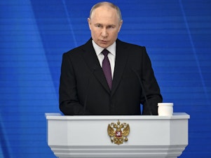 caption: Russian President Vladimir Putin delivers his annual state of the nation address in Moscow on Thursday.