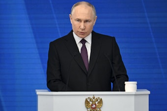 caption: Russian President Vladimir Putin delivers his annual state of the nation address in Moscow on Thursday.