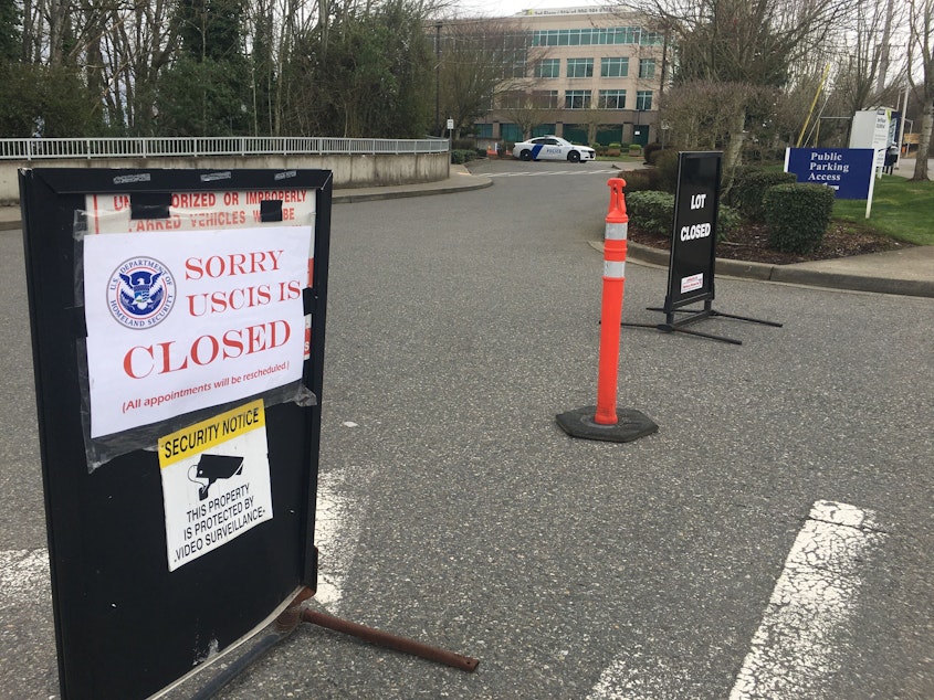 caption: Outside the closed U.S. Citizenship and Immigration Services office in Seattle, WA on March 03, 2020. 