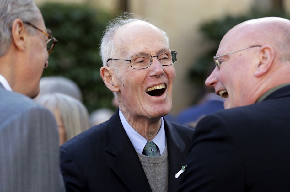 caption: Former U.S. Sen. Slade Gorton shares a smile with friends following a joint funeral Mass for former Gov. John Spellman and his wife, Lois Spellman, at St. James Cathedral Monday, Feb. 12, 2018, in Seattle. John Spellman, the last Republican to serve as Washington's chief executive, died last month at the age of 91. Lois Spellman, his wife of 63 years, died days later. 