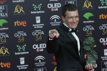 caption: Spanish actor Antonio Banderas is photographed after winning the best leading actor award for <em>Pain and Glory</em> at the Spanish Film Academy's Goya Awards in Málaga, Spain, on Jan. 26.