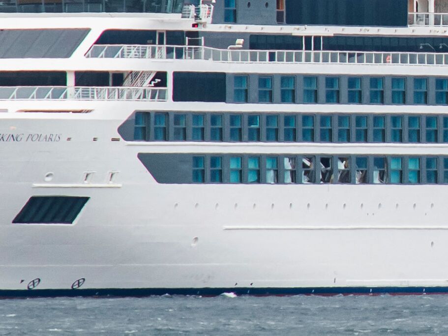 caption: In 2022, a large, unexpected rogue wave struck the Viking Polaris, breaking windows. One passenger died and others were injured. 