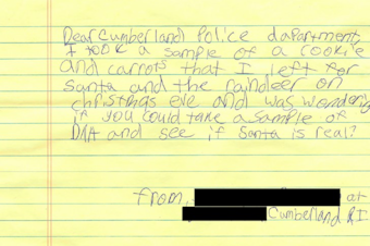 caption: A young girl's note to the police department asked to test for evidence of Santa.