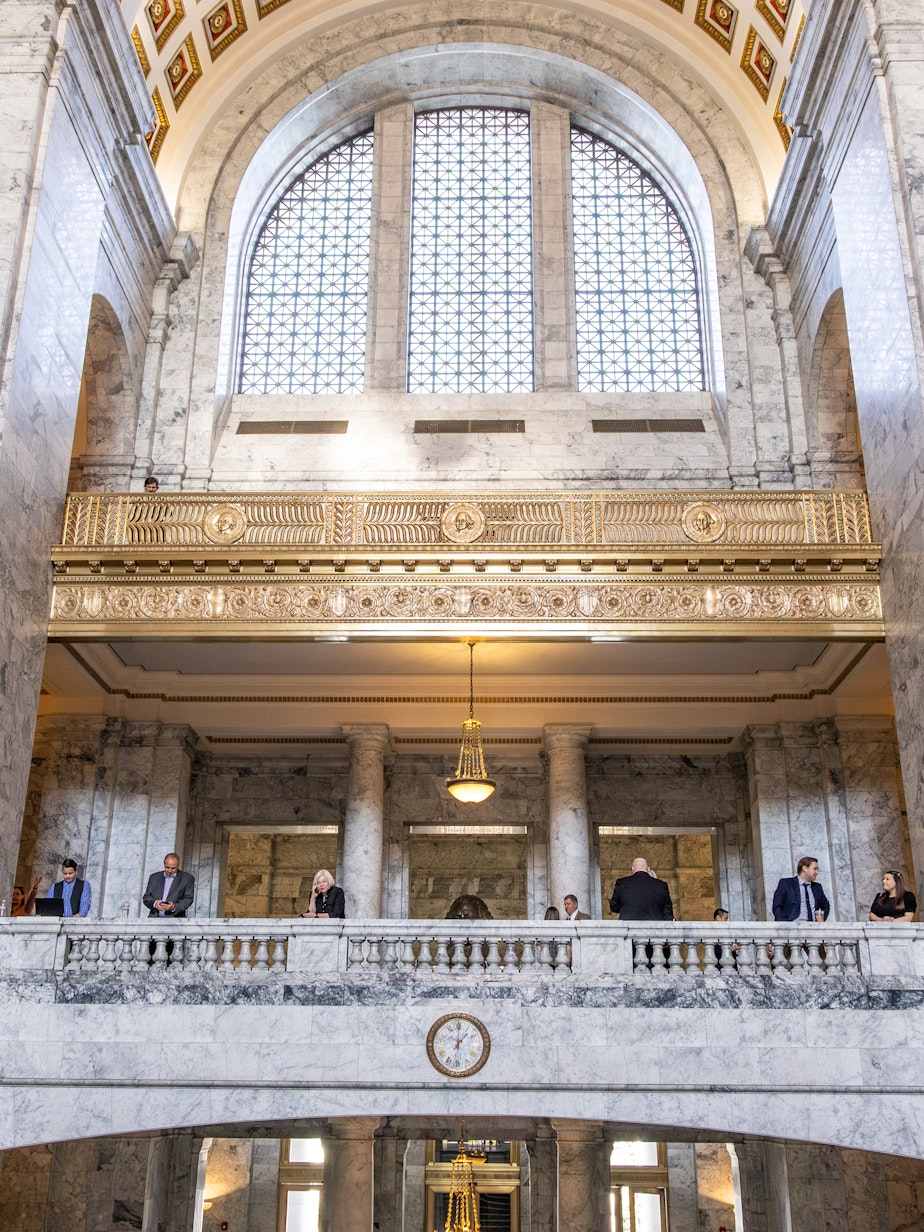 caption: Lobbyists and others in the Washington state Capitol on April 23, 2025.