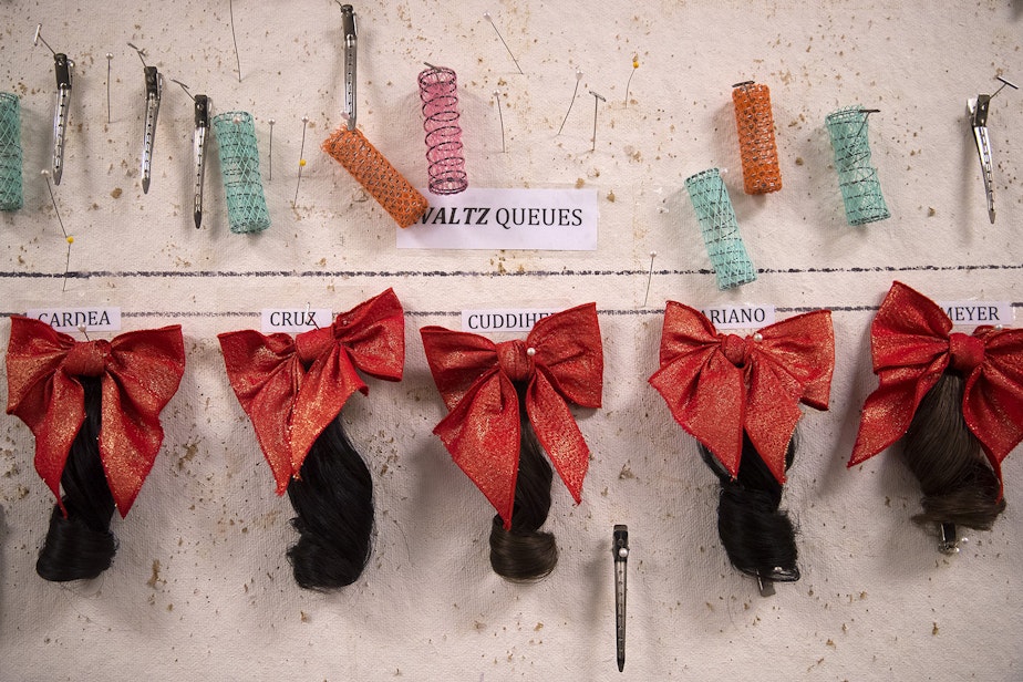 caption: Hair accessories are pinned to a board awaiting Waltzmen dancers before the second act of Cinderella on Saturday, February 1, 2020, at McCaw Hall in Seattle.
