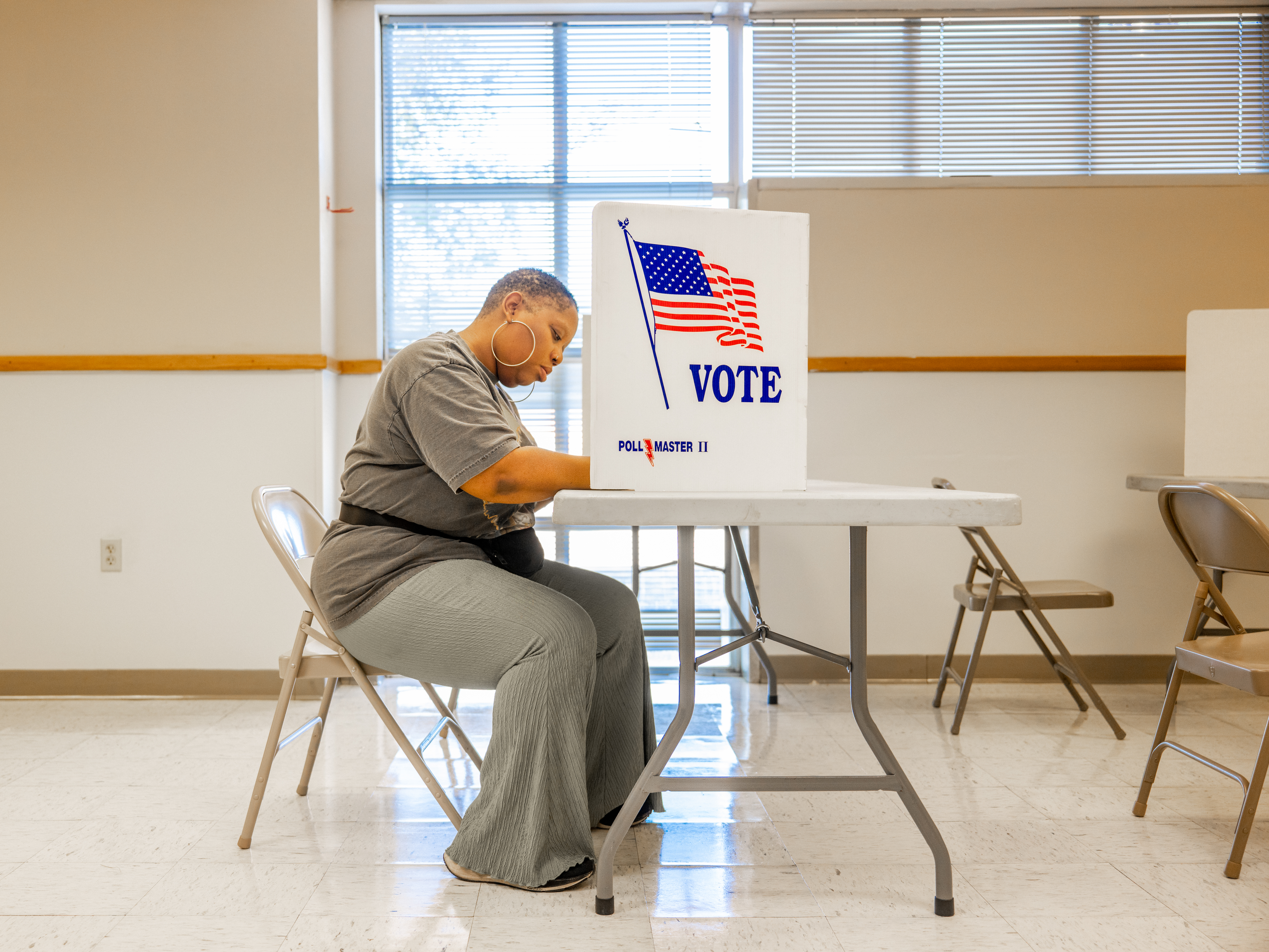 caption: A voter fills out a ballot in Jackson, Miss., on Tuesday. Federal and local officials have worked closely with researchers to track rumors and conspiracy theories in recent elections but that cooperation is fading under pressure from conservatives.
