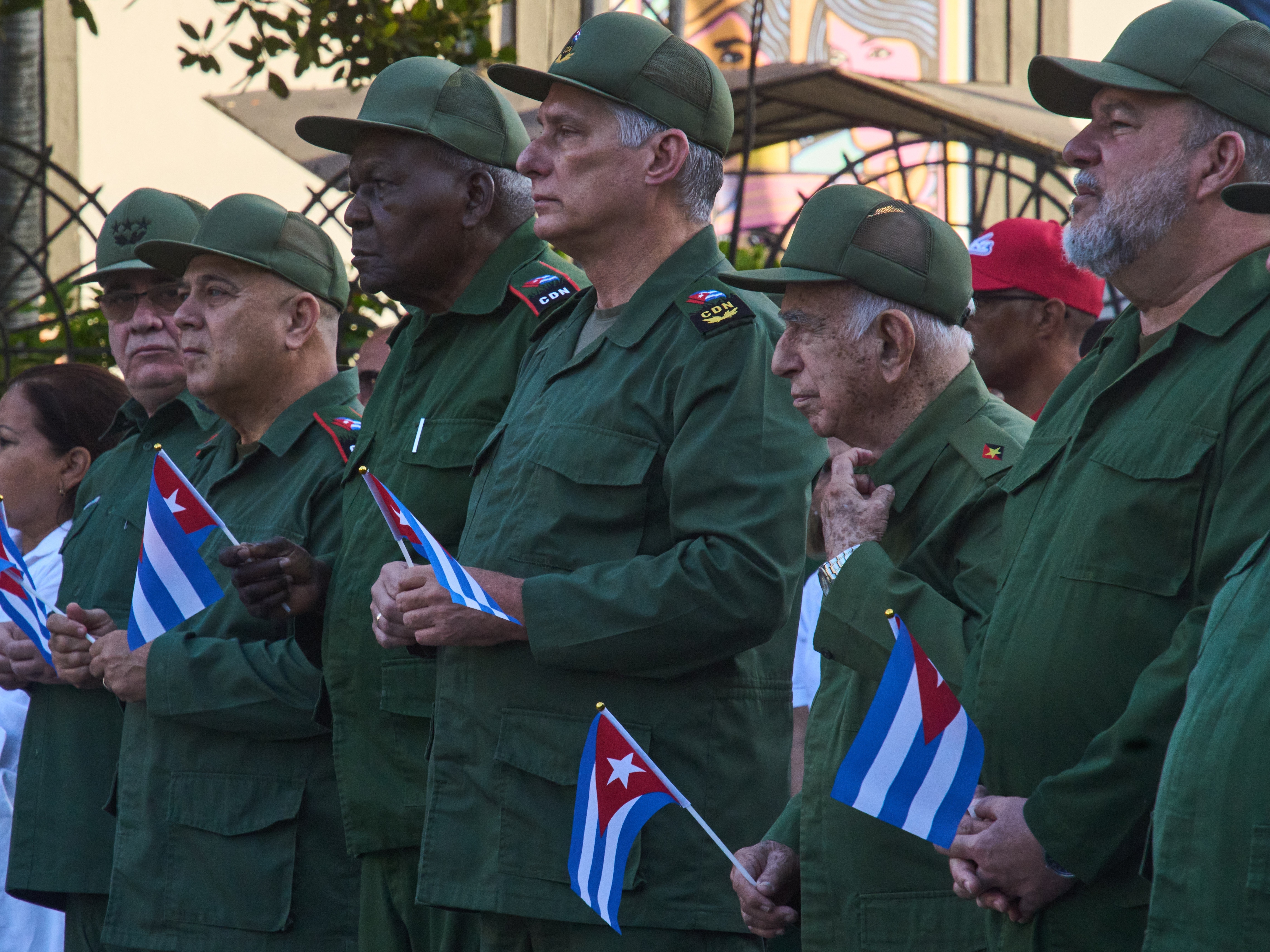 caption: Cuban President Miguel Diaz-Canel, center, attends a celebration marking the 65th anniversary of the proclamation declaring the Cuban Revolution socialist, in Havana, Cuba, Thursday, April 16, 2026.