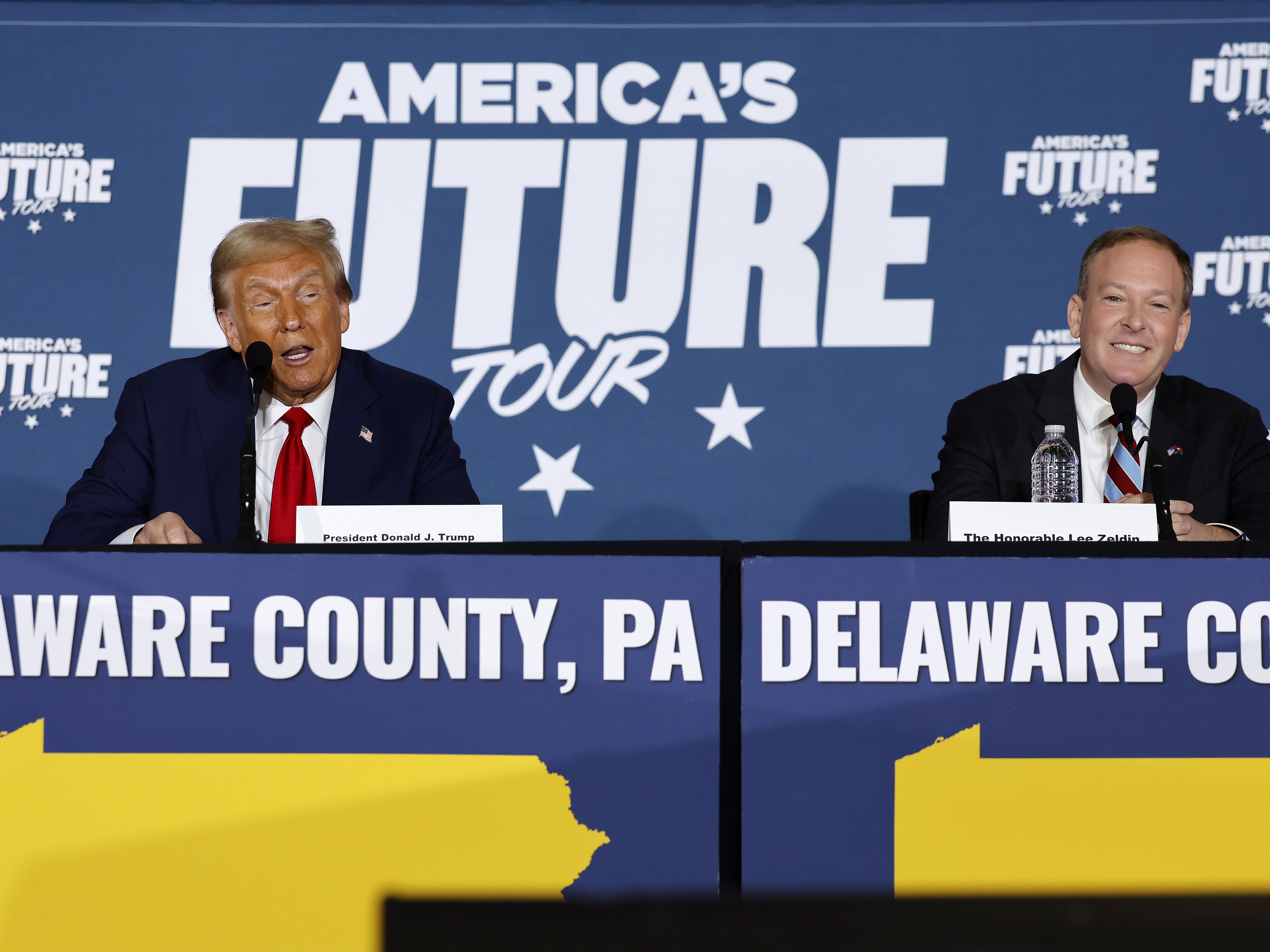 caption: Then-candidate Donald Trump participates in a roundtable discussion with former Republican U.S. Representative from New York, Lee Zeldin, in the battleground state of Pennsylvania just days before voting ended.