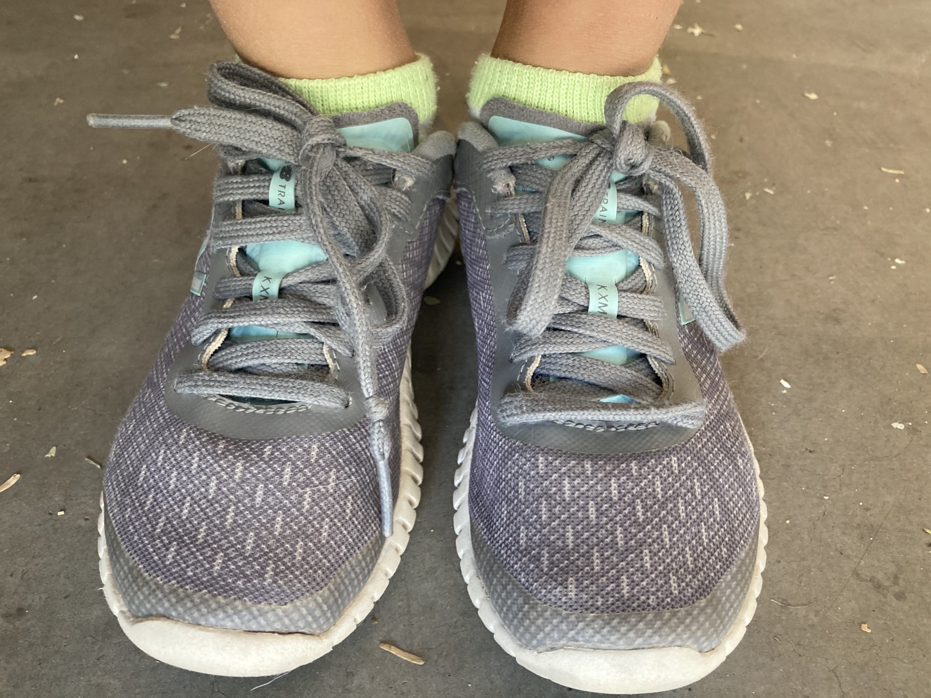 caption: Marissa’s shoes on the day she learned to tie them. (Courtesy)