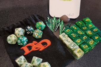 caption: Soundside Producer Jason Burrows' set of Dungeons & Dragons dice for his character Max, the goblin detective.