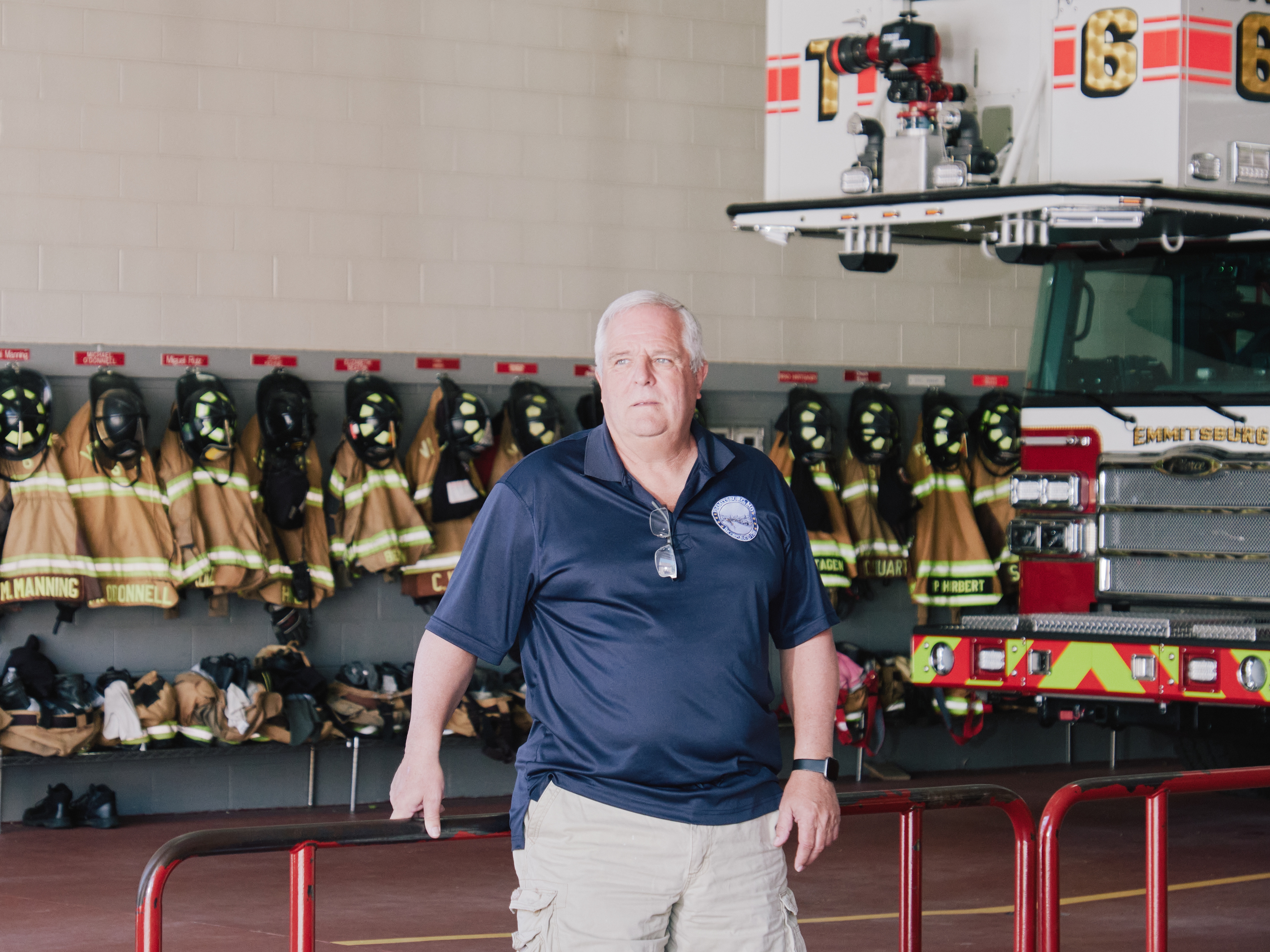 caption: Emmitsburg Mayor Frank Davis voted for Donald Trump in hopes he would cut federal spending. Now Davis hopes those cuts don't include the permanent cancellation of classes at the National Fire Academy, which is part of the town's identity and helps drive its economy. Davis is also a chief at Emmitsburg's firehouse, known as the Vigilant Hose Company.