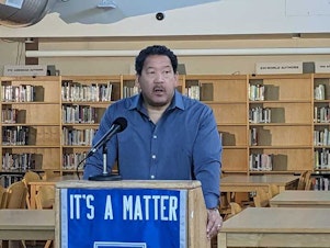 caption: Seattle Mayor Bruce Harrell speaks about a new initiative to address the mental health crisis in youth at Ingraham High School on Wednesday, June 7, 2023
