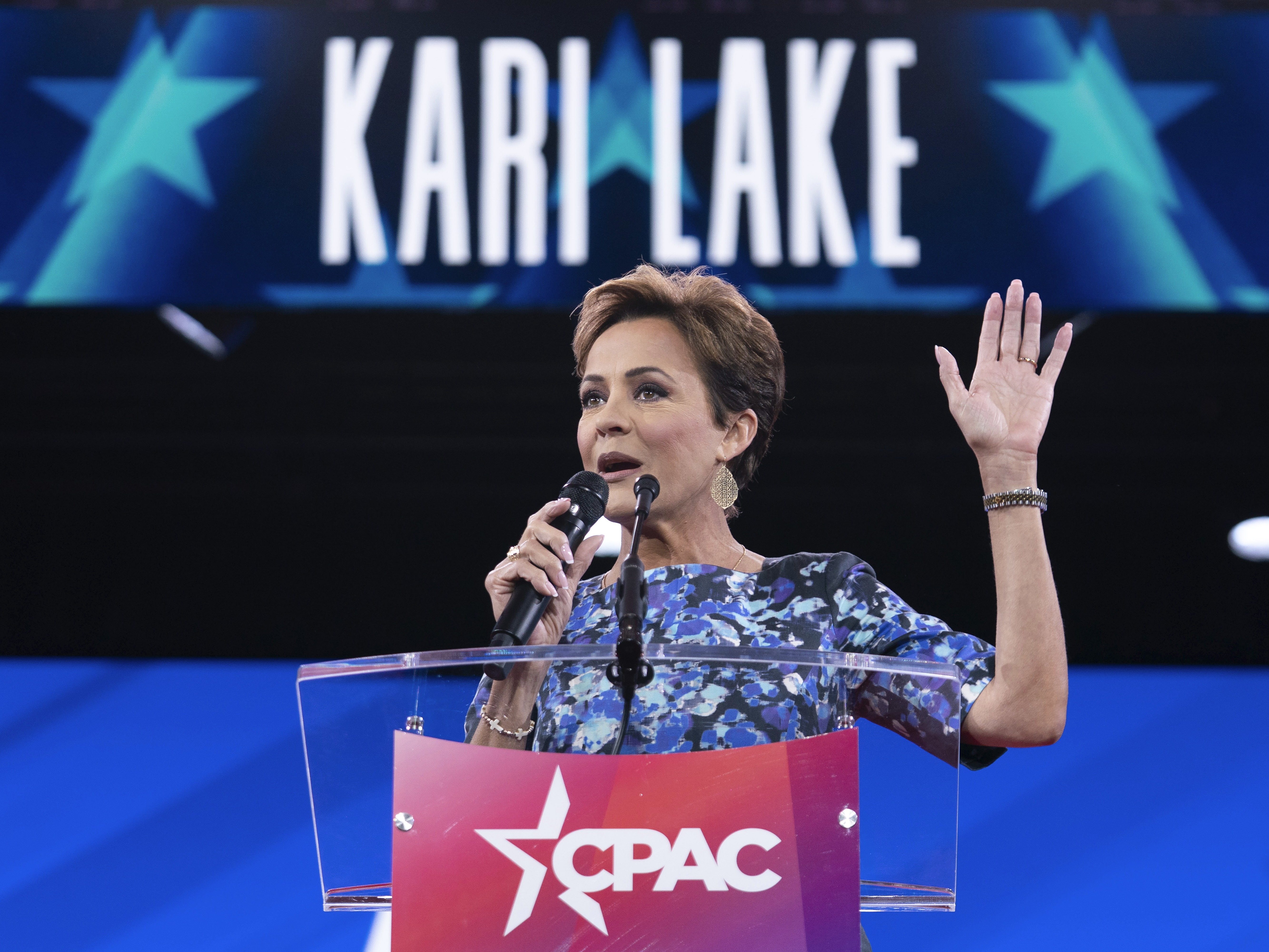 caption: A federal judge in Washington, D.C. ruled on Thursday that administration official Kari Lake had overstepped in firing the director of Voice of America. In this photo, Lake speaks at the Conservative Political Action Conference, CPAC, in February in Oxon Hill, Md.