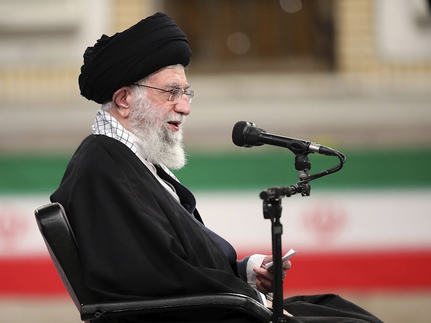 caption: Ayatollah Ali Khamenei, Iran's supreme leader, speaks during a meeting with military commanders in Tehran on Sunday.