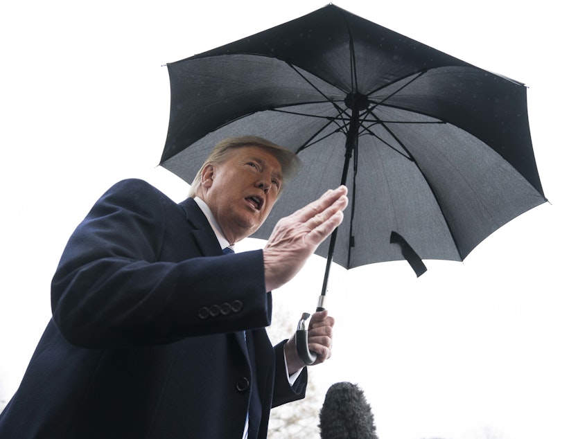 caption: During his remarks to reporters before his departure to Norfolk, Va., President Trump said outside the White House that there was a "possibility that sometime today" there will be a two-week quarantine on parts of New York, Connecticut and New Jersey.