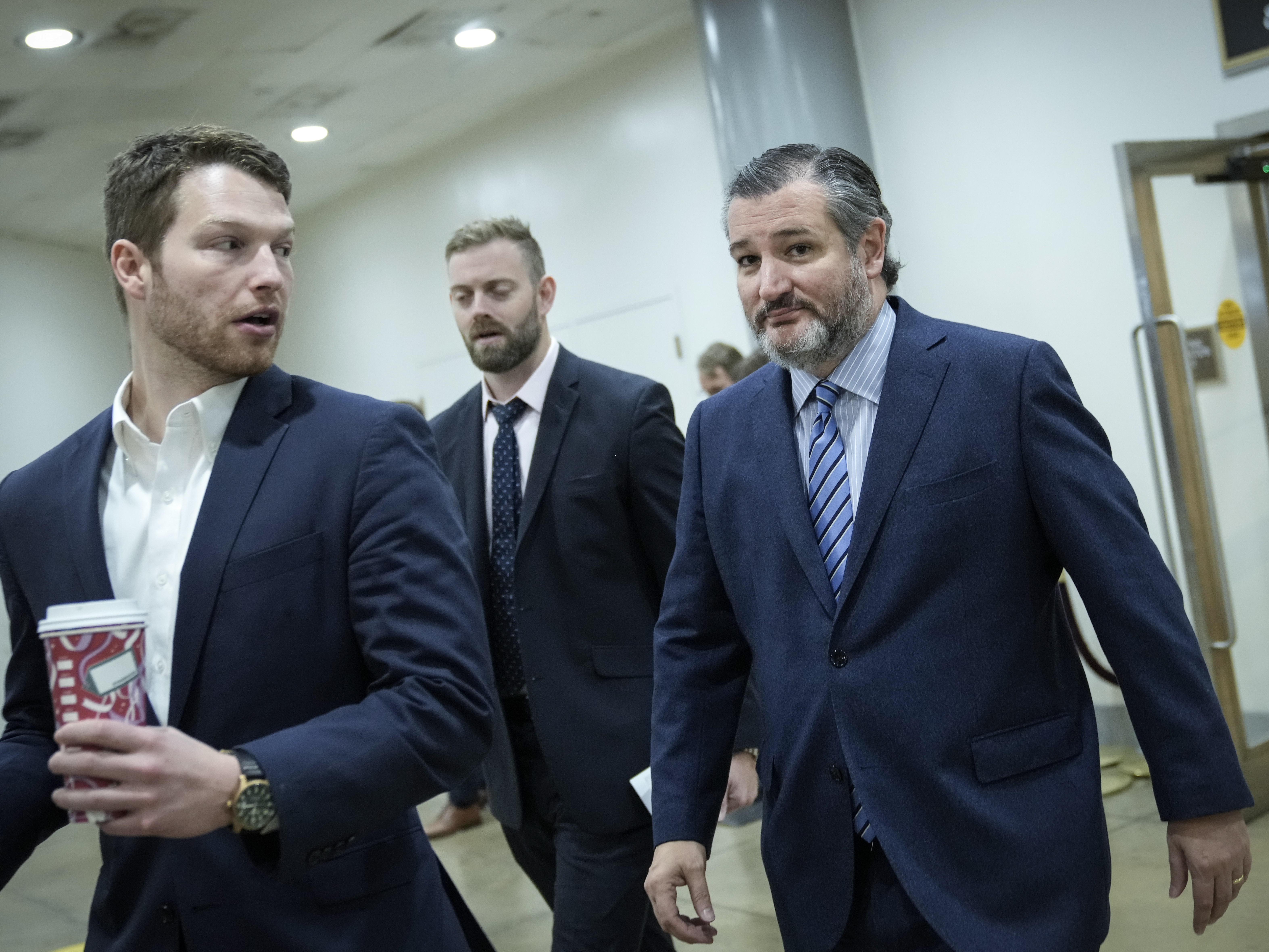 caption: Texas Republican Sen. Ted Cruz, pictured on Capitol Hill Wednesday, said of the attack on the Capitol last year, "Anyone who commits an act of violence should be prosecuted, and anyone who assaults a law enforcement officer should go to jail for a very long time."