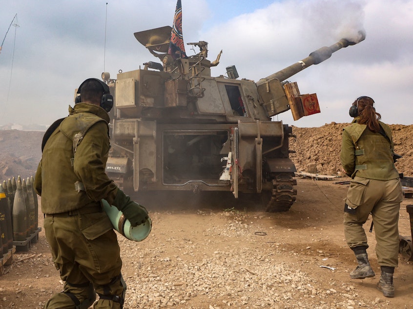 caption: An Israeli artillery unit is pictured near the border with the Gaza Strip on Tuesday, amid continuing battles between Israel and the militant group Hamas.