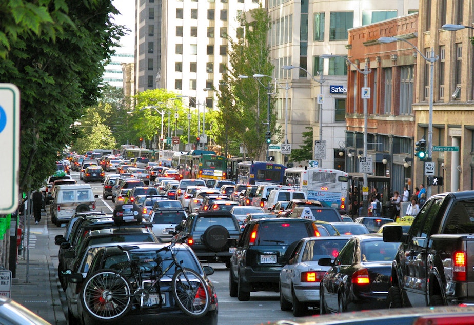 caption: Traffic on Second Avenue in downtown Seattle.