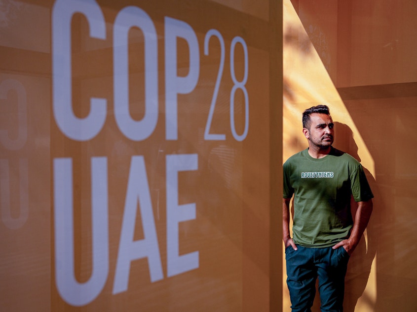 caption: Hamidullah Nadeem, an Afghan climate advocate, attended the COP28 U.N. Climate Summit in Dubai as part of his university delegation. He was on a mission to get help for his homeland in the face of climate-related droughts and floods.