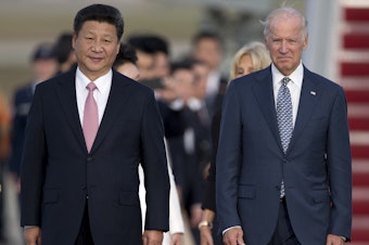 caption: Chinese President Xi Jinping and then-Vice President Joe Biden in 2015 at an arrival ceremony at Joint Base Andrews. China recognized Biden's election as president Friday.
