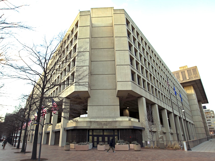 caption: The Federal Bureau of Investigation building in Washington, D.C., is pictured in 2018. A Russian analyst has been charged with lying to the FBI as part of a special counsel investigation into the Trump-Russia probe.
