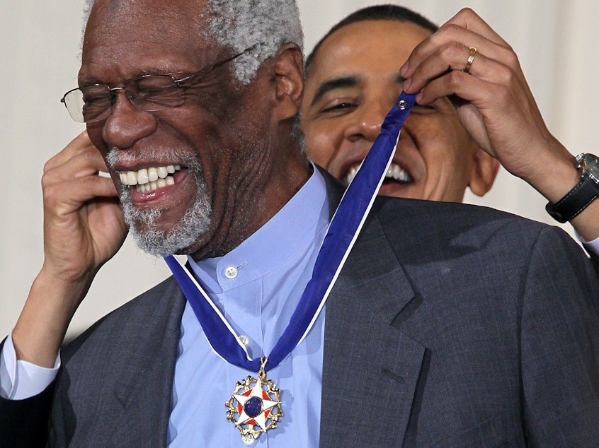 caption: President Barack Obama awards Bill Russell the Presidential Medal of Freedom in 2011. The president recognized Russell not just for his legendary basketball career, but for his work as an activist on and off the court.