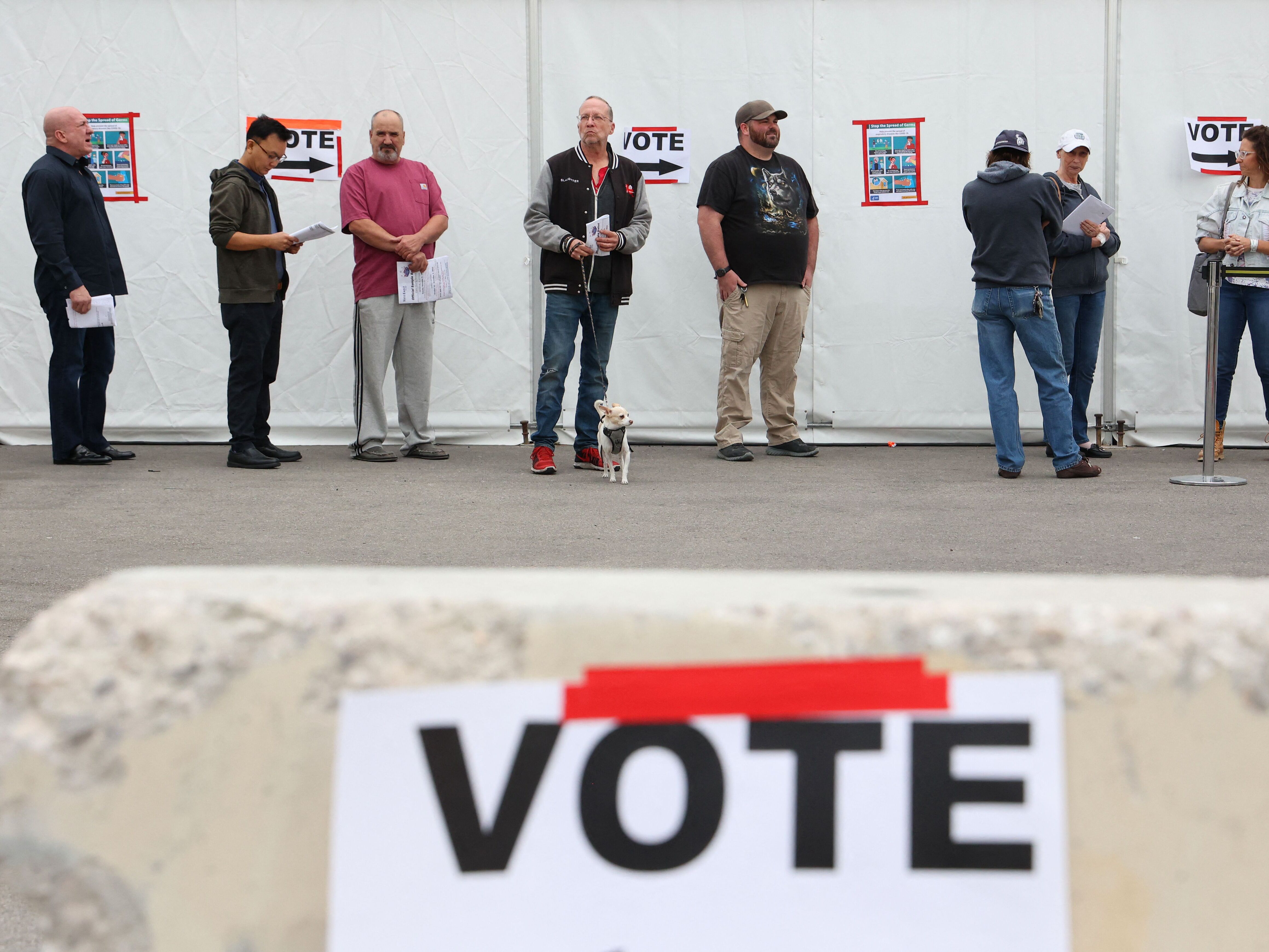 caption: Voters wait in line at a Las Vegas polling place on Nov. 8, 2022. Voters in Nevada — and several other states — may enact big changes to their election systems.