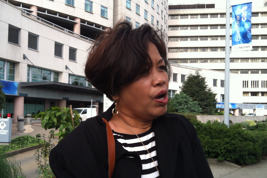 caption: Swedish Medical Center housekeeper Carmencita Smith.