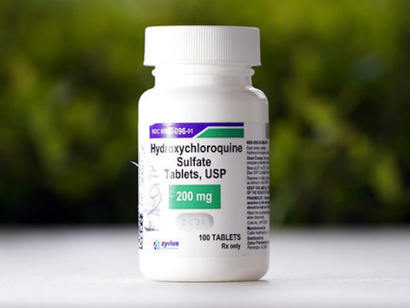 caption: A bottle of hydroxychloroquine tablets in Texas City, Texas. The Food and Drug Administration has rescinded its emergency use authorization for the drug.