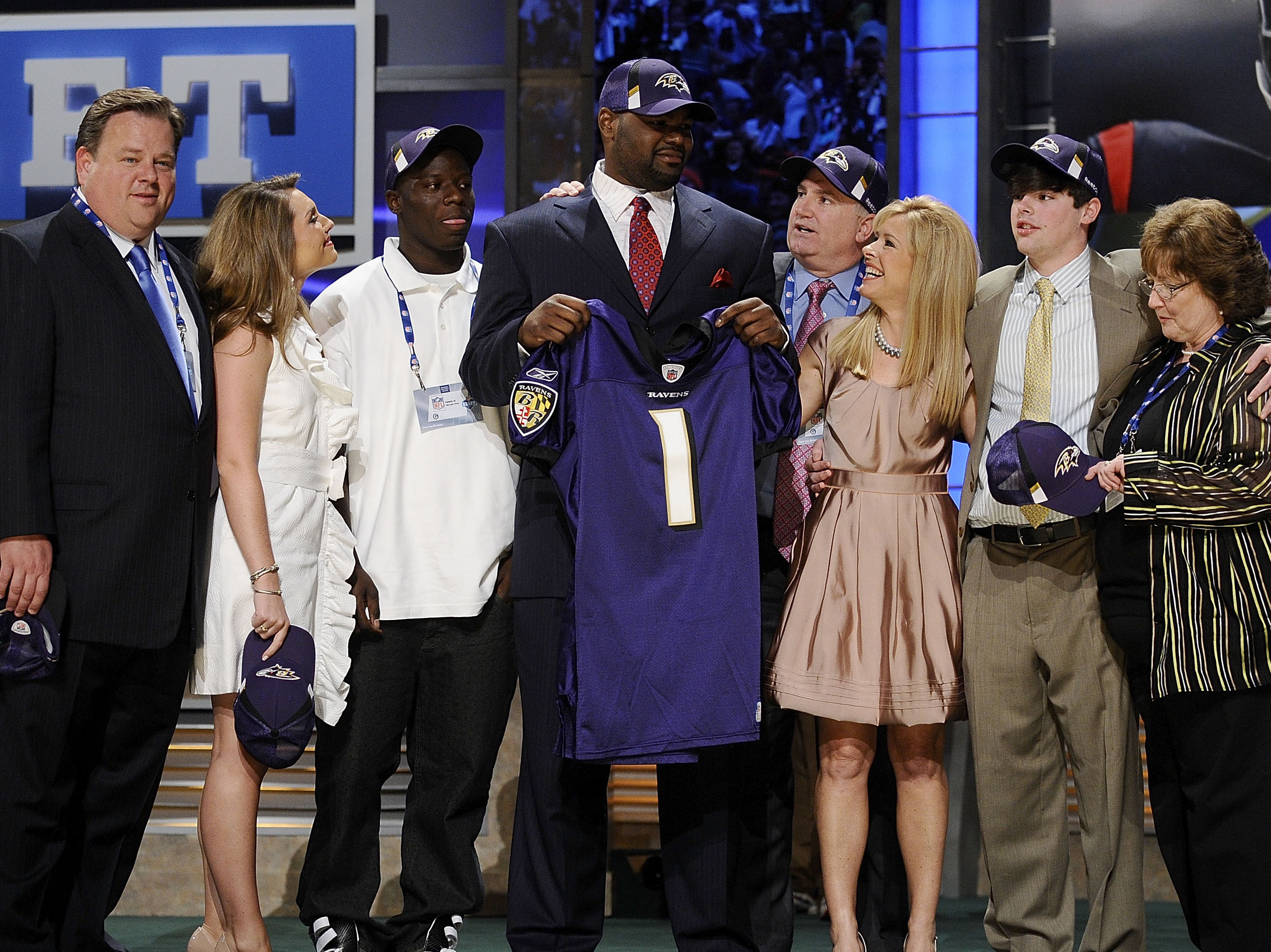 caption: Members of the Tuohy family are speaking out after former NFL player Michael Oher alleged that they earned millions from pushing a false narrative that they adopted him. Here, Oher poses for a photograph with the Tuohy family at Radio City Music Hall for the 2009 NFL Draft on April 25, 2009 in New York City.