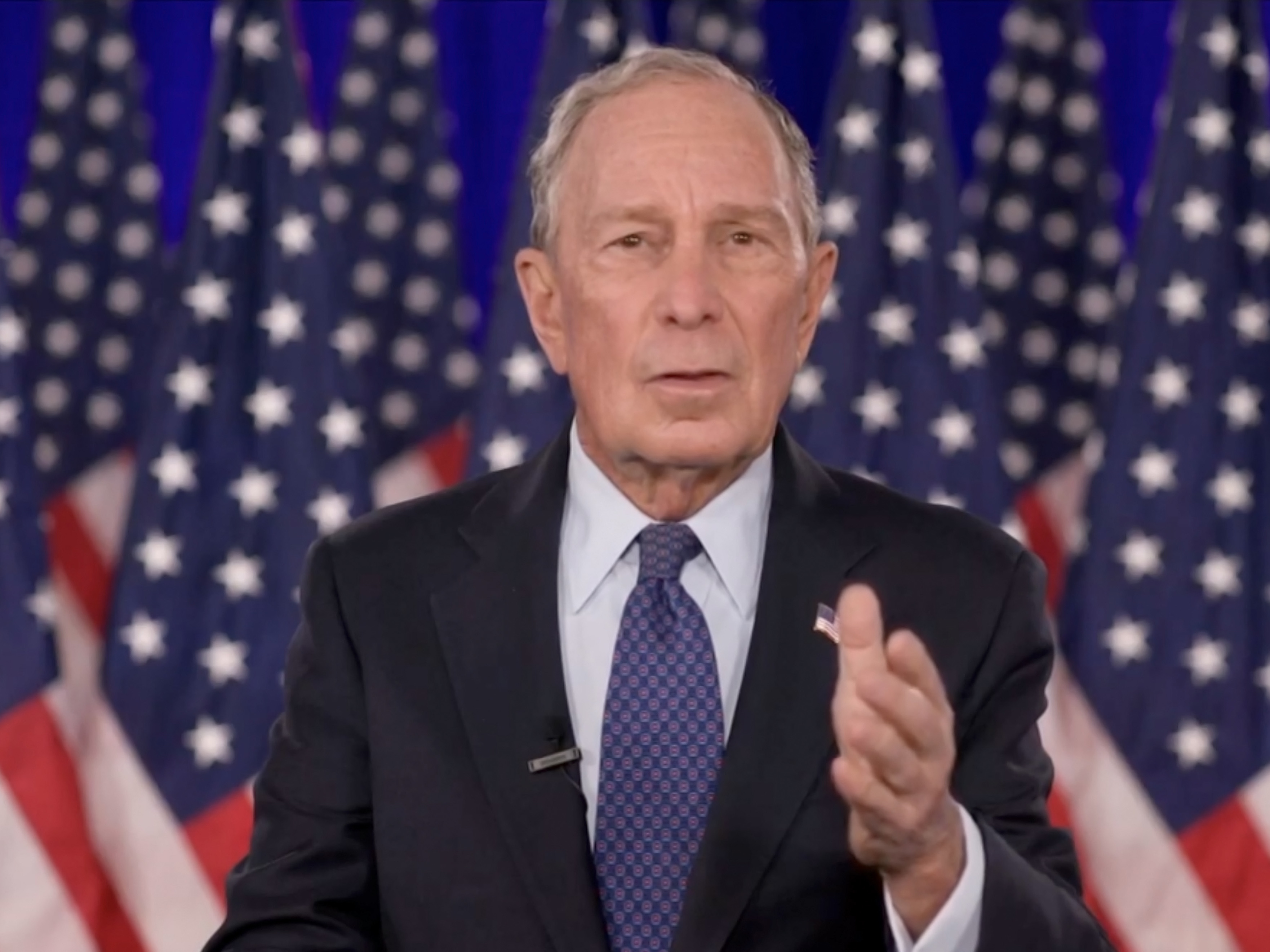 caption: Mike Bloomberg, seen here giving an address during last month's virtual Democratic National Convention, has pledged a big sum to help Joe Biden win Florida.