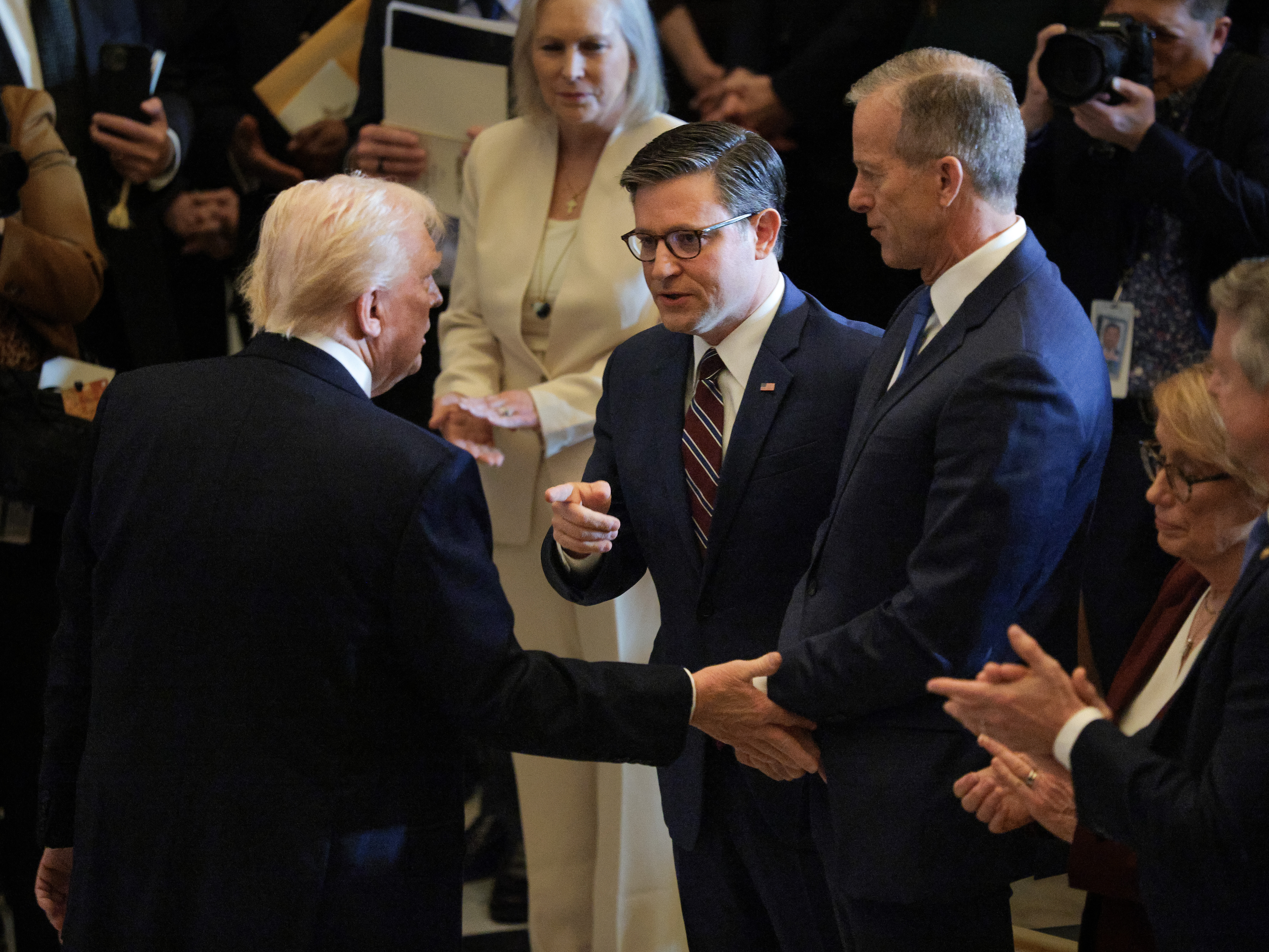 caption: In his first 100 days in office President Donald Trump has signed just five bills into law while issuing over 100 executive actions, a pattern that fits with his vision of a more powerful executive.