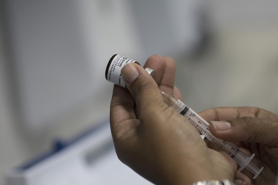 caption: A health worker prepares a syringe with a vaccine against measles in Rio de Janeiro, Brazil, Monday, Aug. 6, 2018. Brazilian health authorities launch a nationwide vaccination campaign Monday against measles and polio, two diseases that are showing up in larger numbers in Latin America's largest nation after being all but eradicated. 