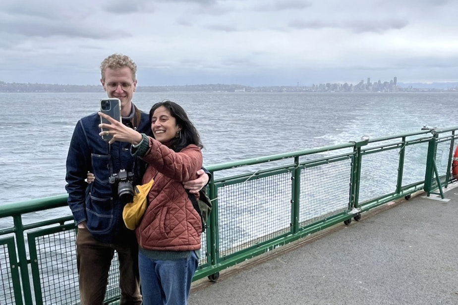 caption: Ryan Miller and Maleeha Syed take a selfie on their way to Bainbridge Island on March 9, 2024