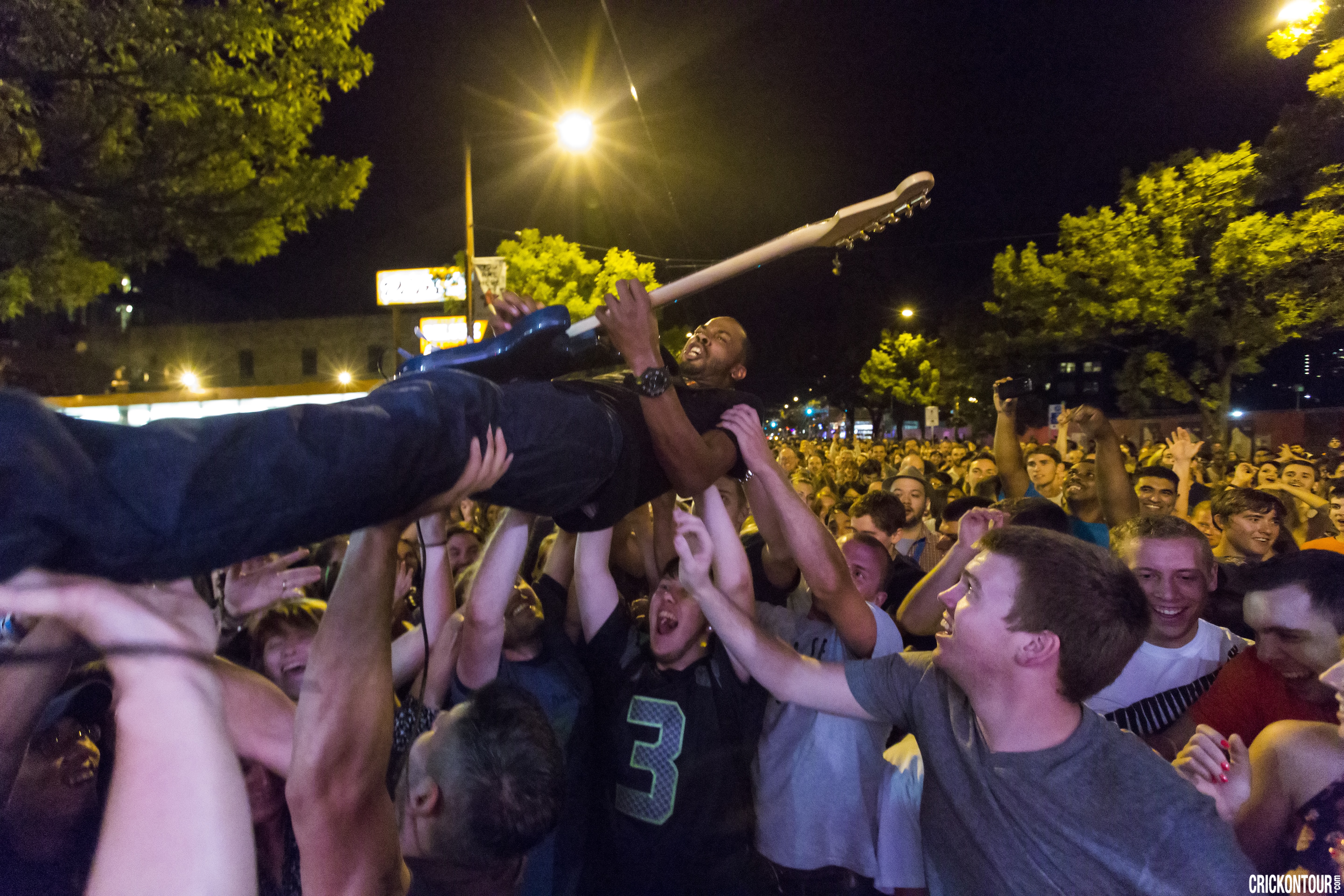 caption: Local musician Ayron Jones crowsurfs at a Seattle performance.