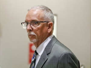 caption: UCLA gynecologist James Heaps appears in Los Angeles Superior Court in 2019.
