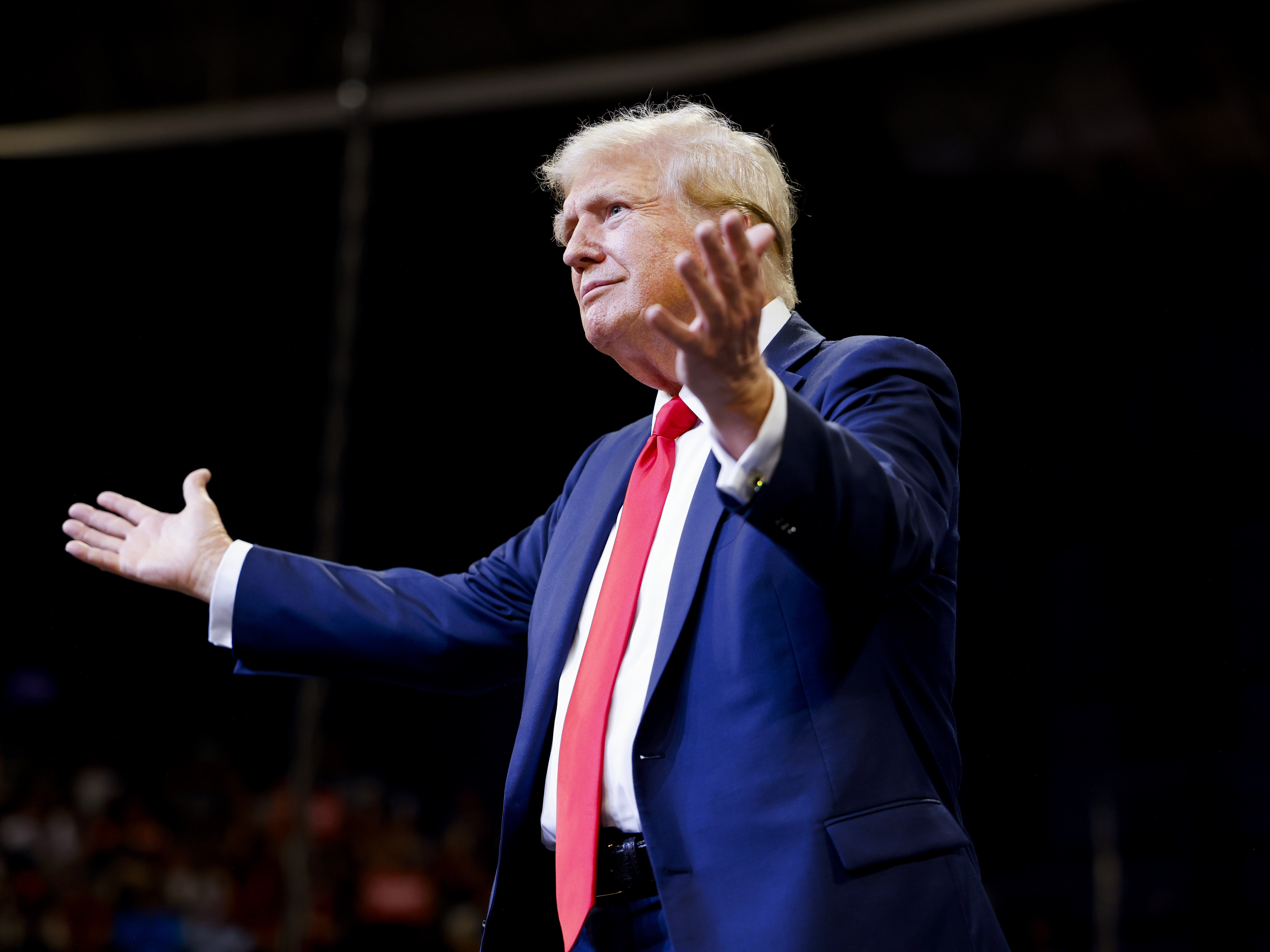 caption: Republican presidential nominee, former President Donald Trump speaks at a rally in Bozeman, Mt., on Friday.