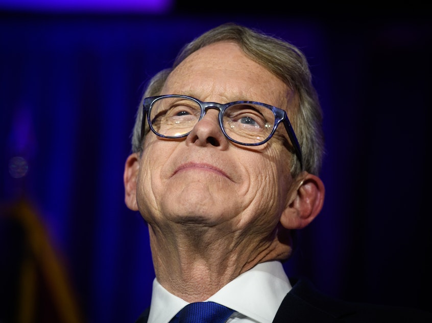 caption: Ohio Gov. Mike DeWine, shown here in 2018, took steps early on to contain the pandemic in his state.