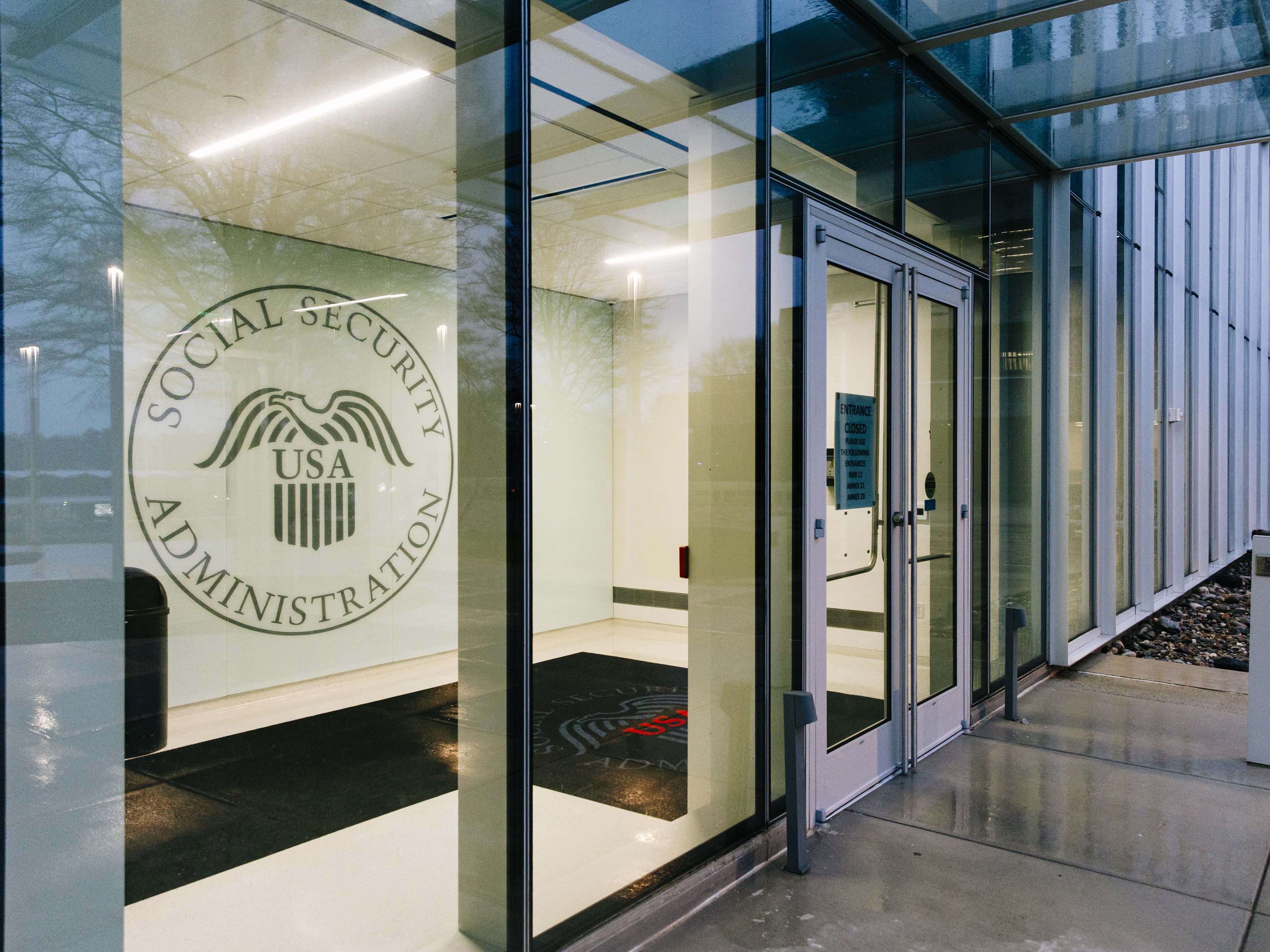caption: A closed entrance to the Social Security Administration Headquarters sits empty in Woodlawn, MD on Thursday, March 20, 2025.